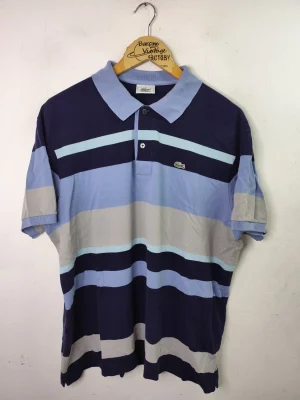 Lacoste polo azul marino y turquesa a rayas L XL