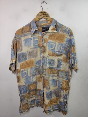 Camisa azul claro y amarillo mostaza estampada vintage 80s XL XXL